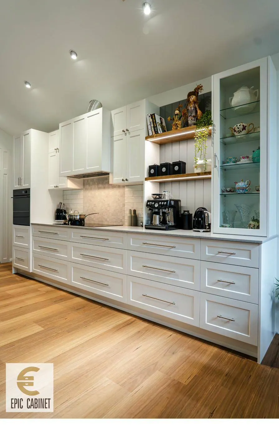 Custom joinery Melbourne - bespoke kitchen with open shelving and glass cabinetry