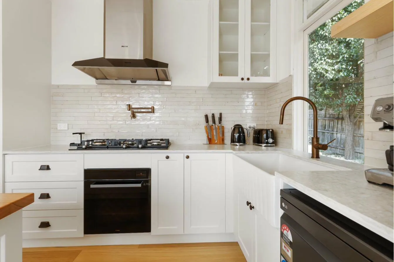 Custom laundry cabinetry Melbourne with stone benchtop