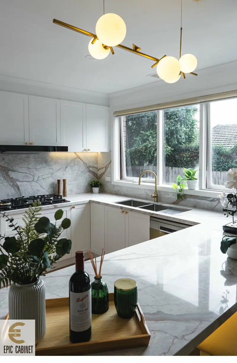 Glen Waverley modern kitchen with dramatic marble stone benchtop and white cabinetry