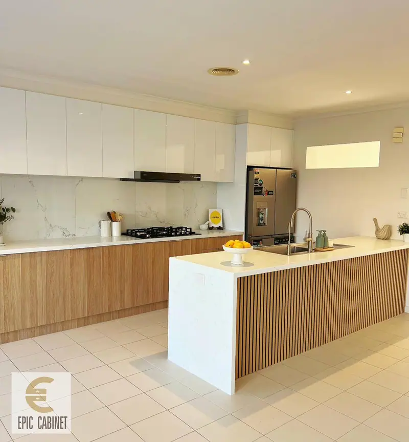 Mulgrave modern kitchen with timber veneer lower cabinets, gloss white uppers and stone benchtop